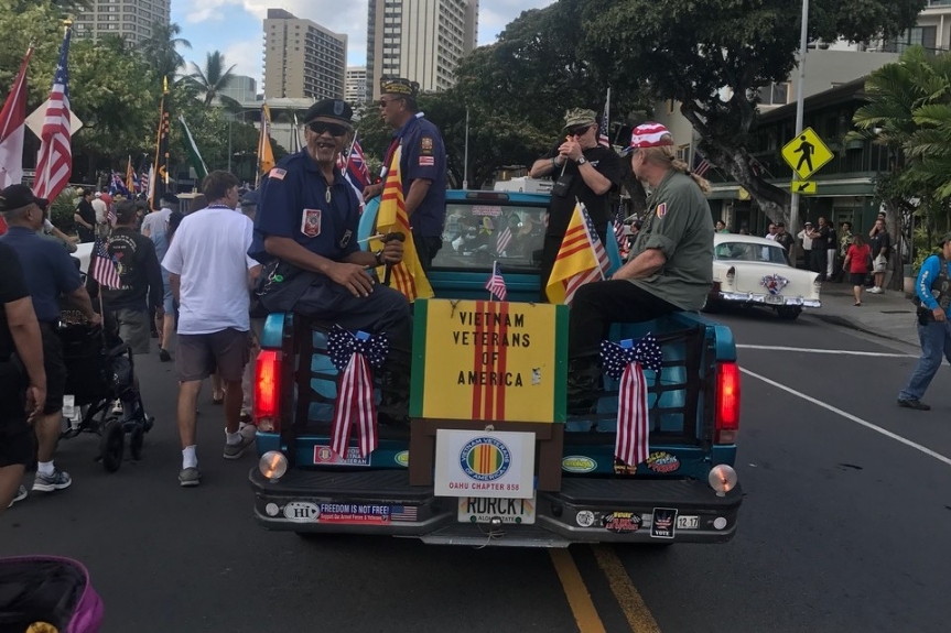 May 2017.  Post 1540 Life Legacy Member Nick Young and Life Member John Kahaloa (in blue, L-R) participate in a long-overdue welcome home parade for Vietnam War veterans. Also participating was Life Member Patrick Suenaga (photo by Pat Suenaga).