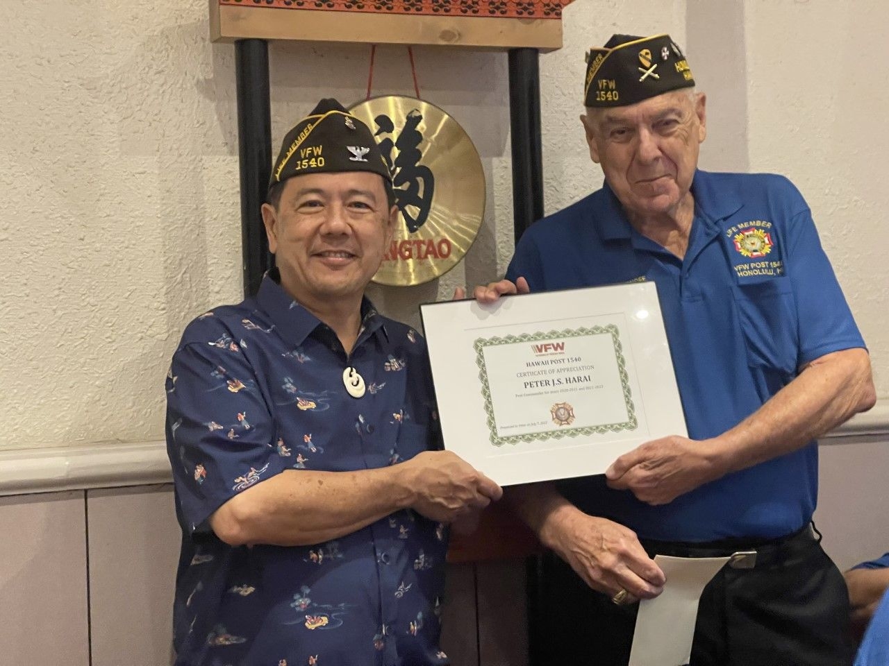 Incoming Post Commander 22-23 Gary Westernoff presents a certificate of thanks to out-going post Commander 21-22 Peter Hirai.